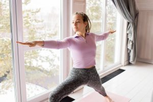 Yoga poses such as sun salutation to boost Vitamin D absorption naturally.